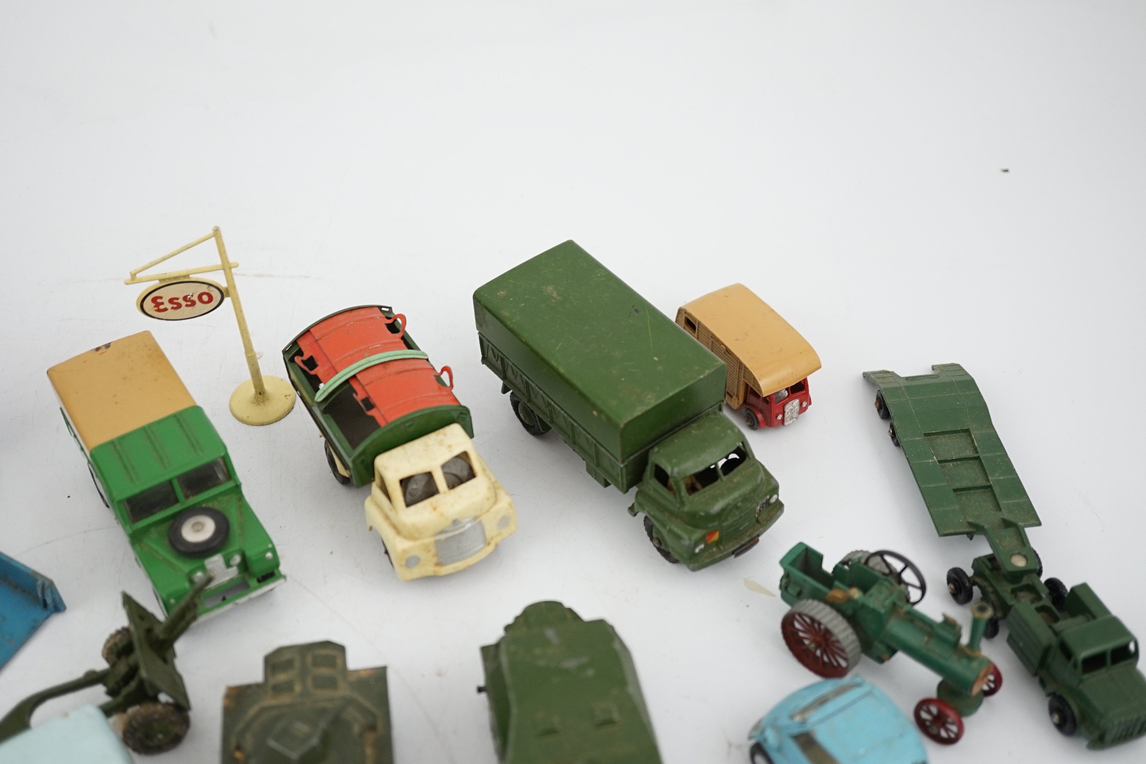 Thirty-eight diecast vehicles by Dinky Toys, Corgi Toys, Matchbox, etc. including a Spot-On BMW Isetta, military Dinky vehicles, Matchbox Series, etc.